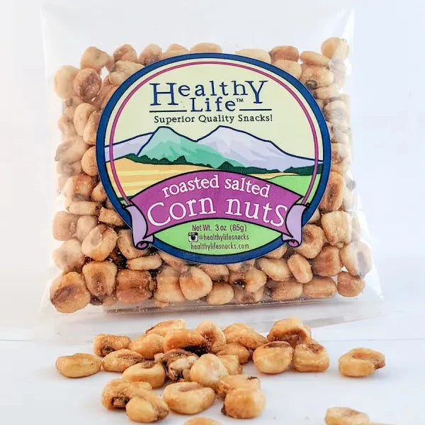 A clear plastic bag filled with roasted salted corn nuts, with the brand 'Healthy Life' displayed on the label.